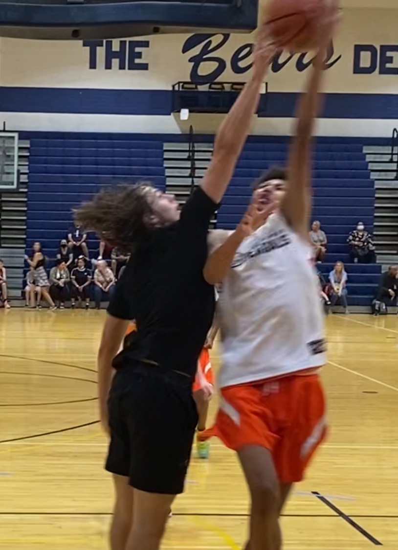 Check out the photos and videos of the men's basketball recruiting profile Anders Mazick