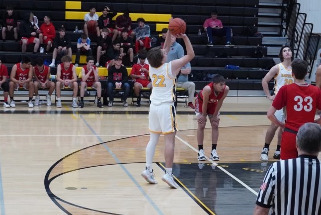 Check out the photos and videos of the men's basketball recruiting profile Anders Mazick