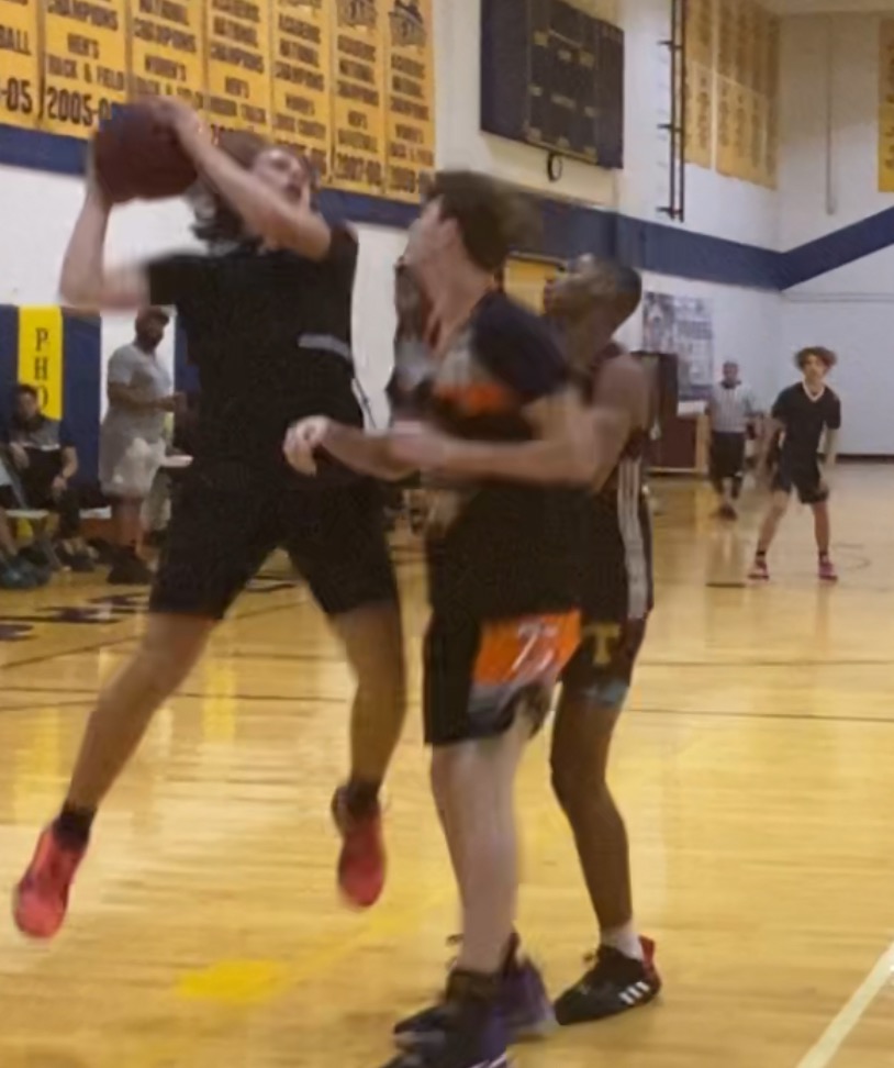 Check out the photos and videos of the men's basketball recruiting profile Anders Mazick