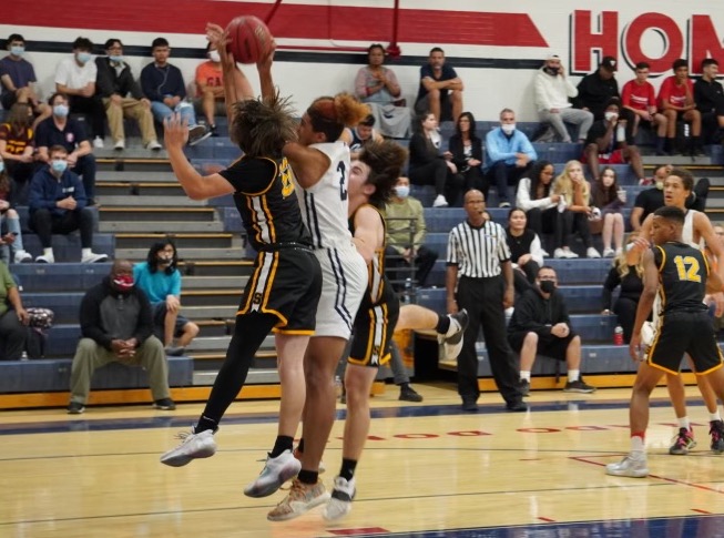 Check out the photos and videos of the men's basketball recruiting profile Anders Mazick