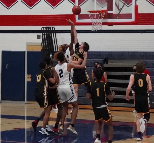 Check out the photos and videos of the men's basketball recruiting profile Anders Mazick